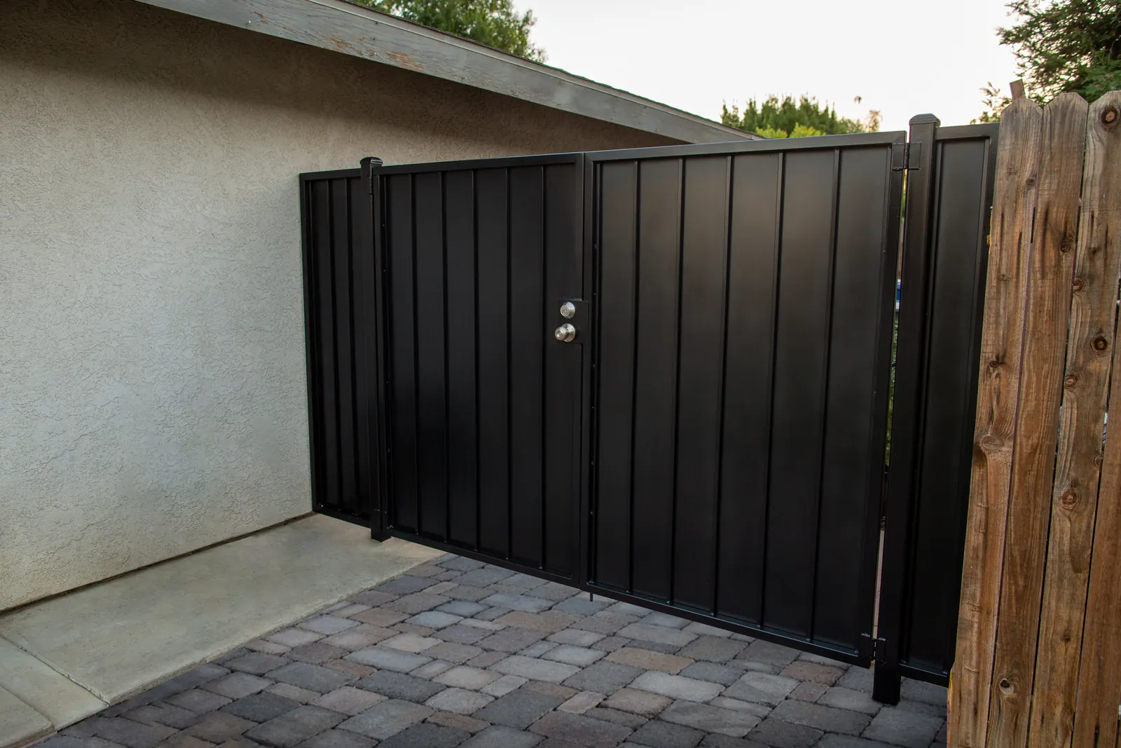 Black double metal driveway gate