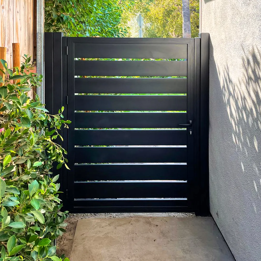 Black horizontal slat pedestrian metal gate